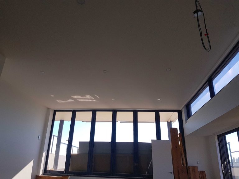 Crisp plaster cornice and ceiling line in a Sydney home
